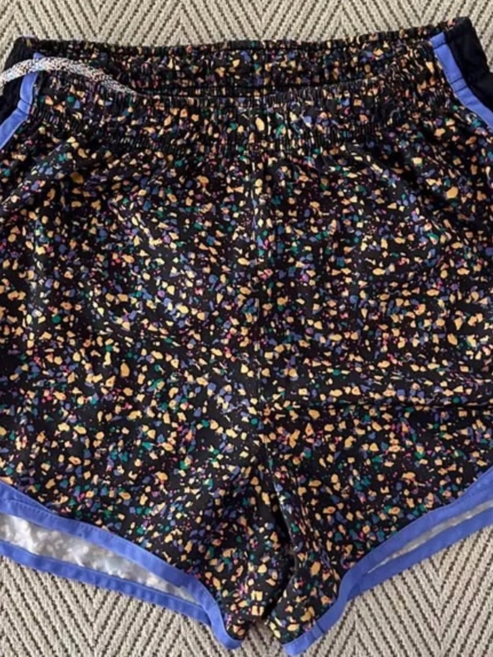 Size Small Women’s Nike Black Printed Athletic Shorts with Blue Trim